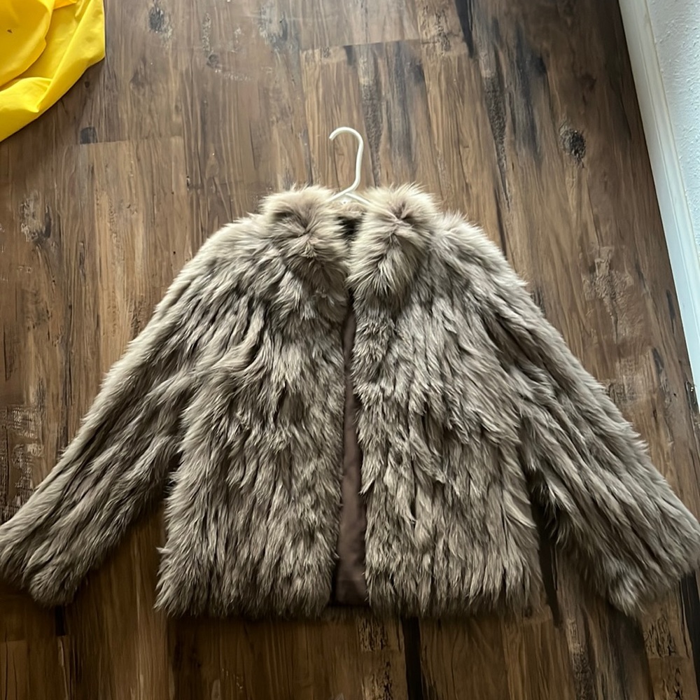 size 40 women’s (XL) fur jacket. brand new in closet for years